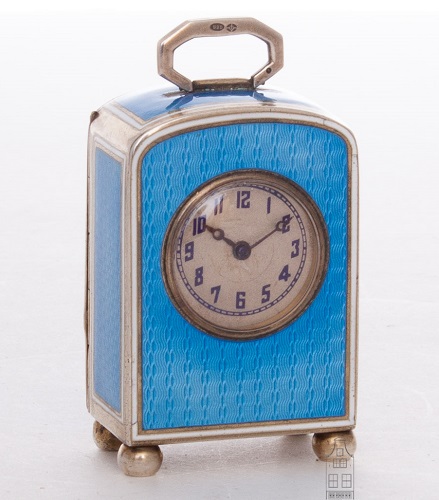 A sub miniature Swiss Art Deco silver guilloche translucent enamel travel clock, circa 1920. 